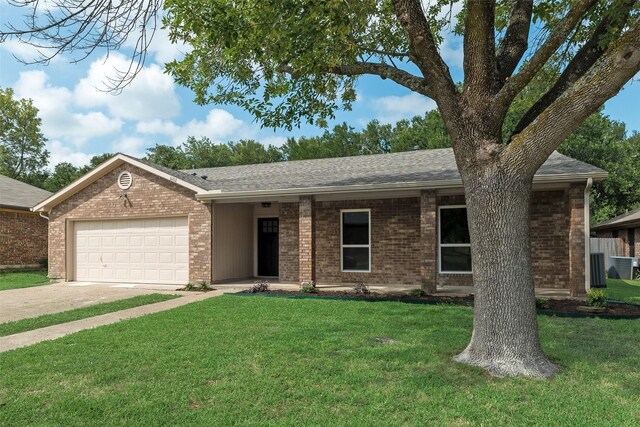 6102 Azalea Dr, Rowlett, TX 75089 - ranch-style home featuring an attached garage, a front lawn, driveway, and brick siding