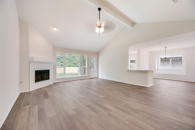 6102 Azalea Dr, Rowlett, TX 75089 - unfurnished living room featuring ceiling fan, wood finished floors, a fireplace, and baseboards