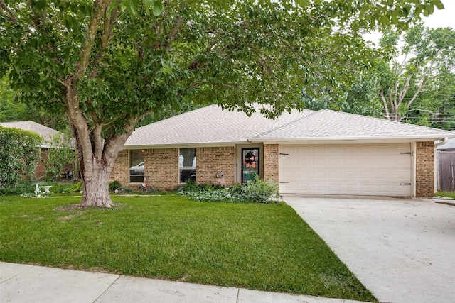 4920 Brookhollow Dr, Sachse, TX 75048 - ranch-style house with a garage, a front yard, concrete driveway, brick siding, and a shingled roof