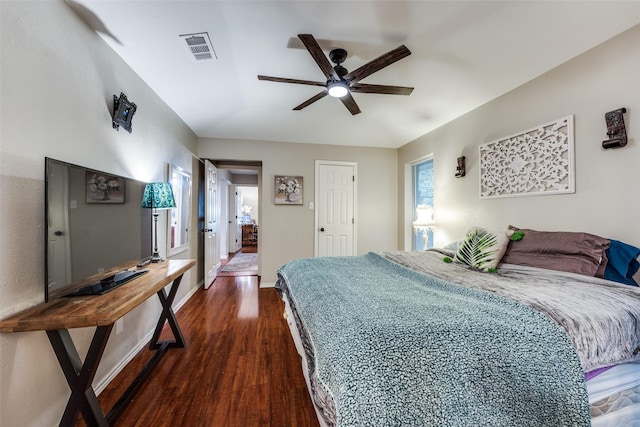 4920 Brookhollow Dr, Sachse, TX 75048 - bedroom with dark wood-type flooring, ceiling fan, and baseboards