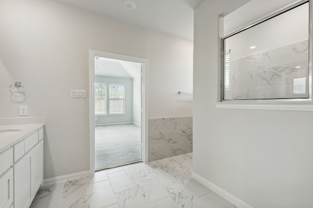 1426 Red Clover Ave, Van Alstyne, TX 75495 - bathroom featuring baseboards, marble finish floors, and vanity