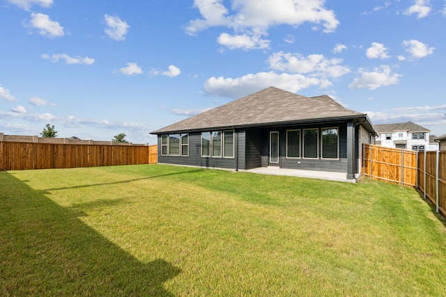 1426 Red Clover Ave, Van Alstyne, TX 75495 - back of property with a patio area and a shingled roof