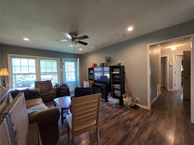 703 Jeanell St, Quitman, TX 75783 - living area featuring dark wood-style flooring, ceiling fan, recessed lighting, and baseboards