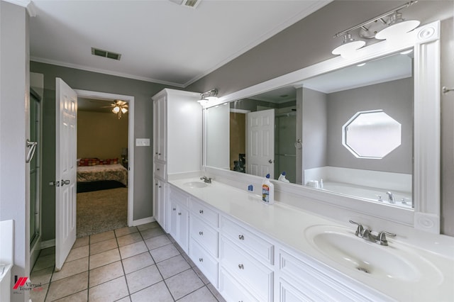 6008 Pepperwood Cir, Bossier City, LA 71111 - bathroom with double vanity, connected bathroom, a bath, crown molding, and tile patterned flooring