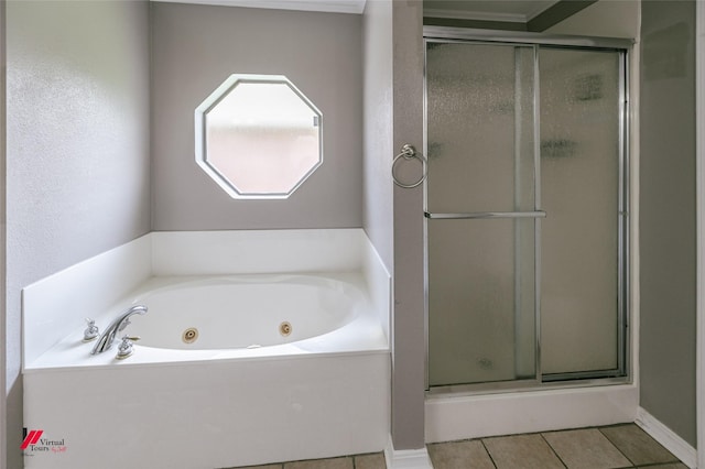 6008 Pepperwood Cir, Bossier City, LA 71111 - full bath with tile patterned floors, a shower stall, and a whirlpool tub