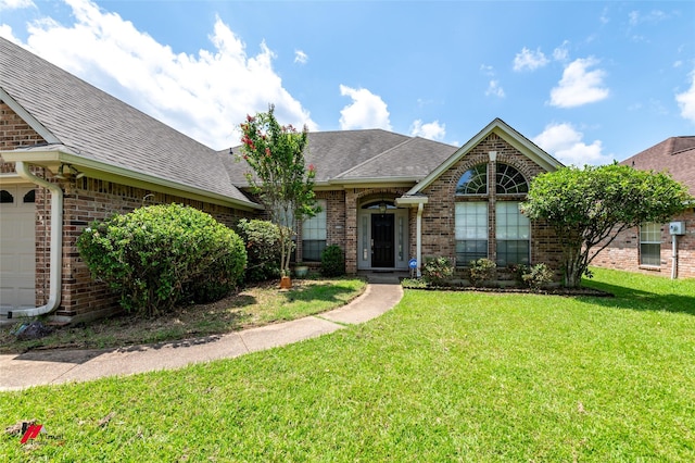 6008 Pepperwood Cir, Bossier City, LA 71111 - view of front of property featuring brick siding, a shingled roof, and a front lawn