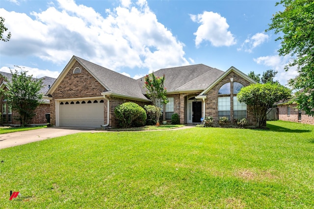 6008 Pepperwood Cir, Bossier City, LA 71111 - view of front facade featuring brick siding, a garage, a front yard, a shingled roof, and concrete driveway