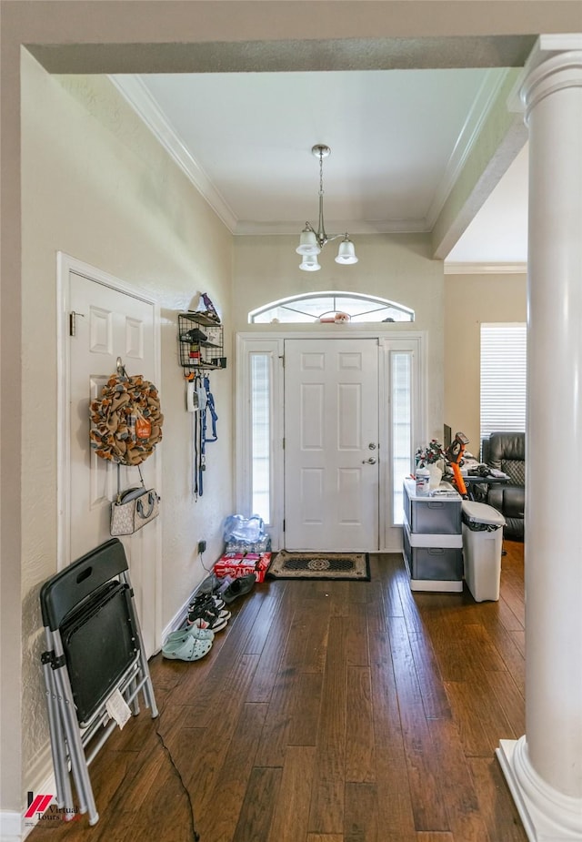 6008 Pepperwood Cir, Bossier City, LA 71111 - foyer entrance featuring ornate columns, dark wood-style floors, ornamental molding, plenty of natural light, and heating unit