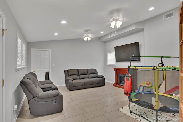 9346 Shartel Dr, Shreveport, LA 71118 - living area featuring recessed lighting, a fireplace, plenty of natural light, and a ceiling fan