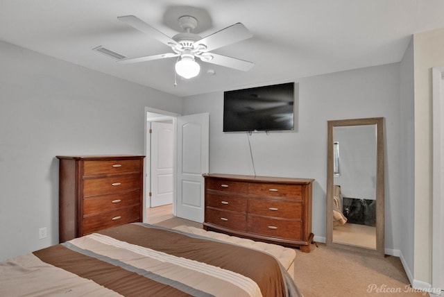 9346 Shartel Dr, Shreveport, LA 71118 - bedroom with light colored carpet and a ceiling fan