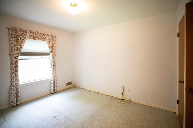 10210 E Lk Highlands, Dallas, TX 75218 - carpeted empty room featuring baseboards