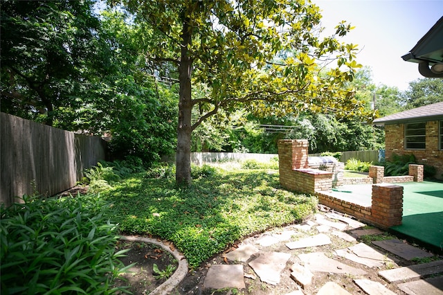 10210 E Lk Highlands, Dallas, TX 75218 - fenced backyard featuring a patio area