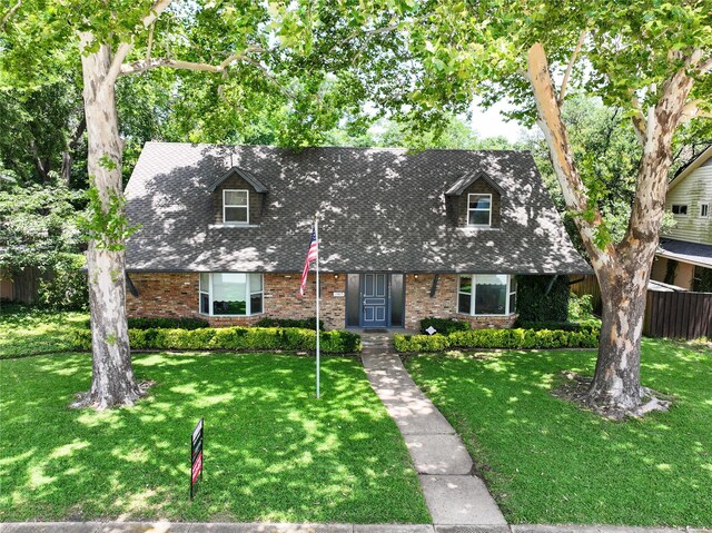 10210 E Lk Highlands, Dallas, TX 75218 - cape cod home with brick siding and a shingled roof