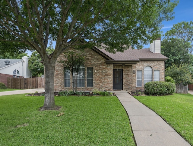 43 Alamosa Dr, Trophy Club, TX 76262 - view of front of property with brick siding, a chimney, and a shingled roof