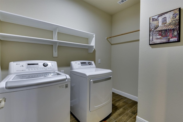 1541 Seabiscuit Dr, Granbury, TX 76049 - laundry room with washing machine and dryer, wood tiled floors, and baseboards
