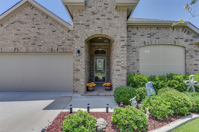 1541 Seabiscuit Dr, Granbury, TX 76049 - view of front of house featuring brick siding, concrete driveway, and an attached garage