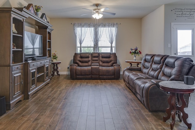 1541 Seabiscuit Dr, Granbury, TX 76049 - living area with a ceiling fan, dark wood-type flooring, and baseboards