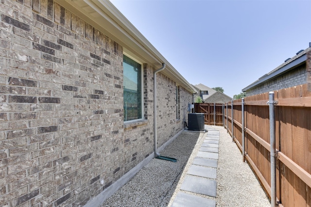 1541 Seabiscuit Dr, Granbury, TX 76049 - view of property exterior featuring a fenced backyard and central AC unit