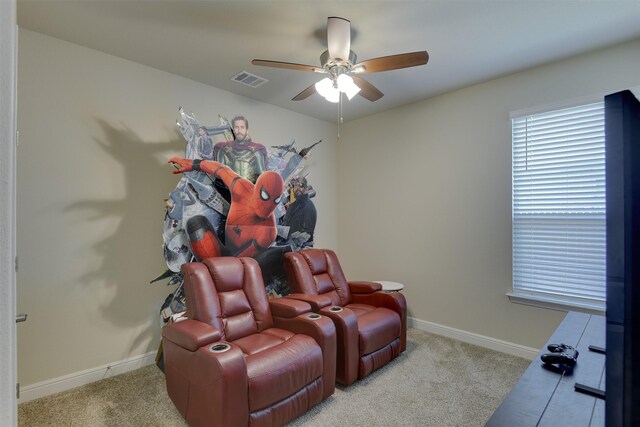 1541 Seabiscuit Dr, Granbury, TX 76049 - carpeted home theater room with a ceiling fan and baseboards