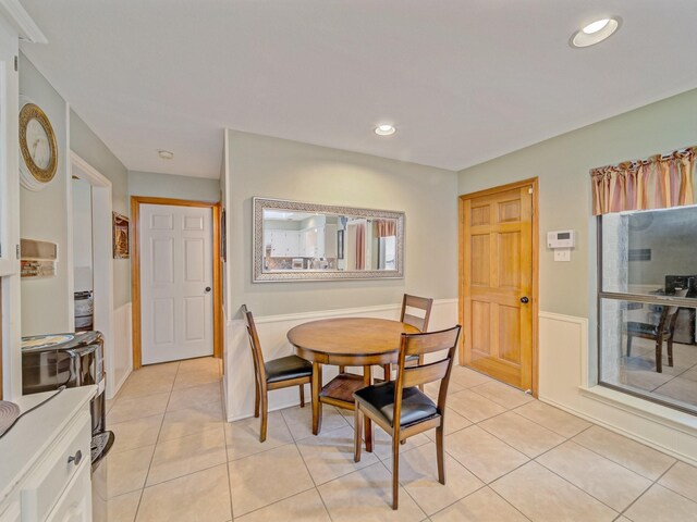 4640 Versailles Ln, Plano, TX 75093 - dining room with light tile patterned floors and recessed lighting