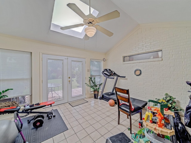 4640 Versailles Ln, Plano, TX 75093 - workout room featuring brick wall, french doors, light tile patterned flooring, a skylight, and a ceiling fan
