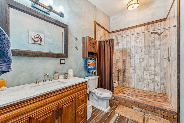 2283 US Highway 281 N, Jacksboro, TX 76458 - full bathroom featuring toilet, vanity, tiled shower, and wood finished floors