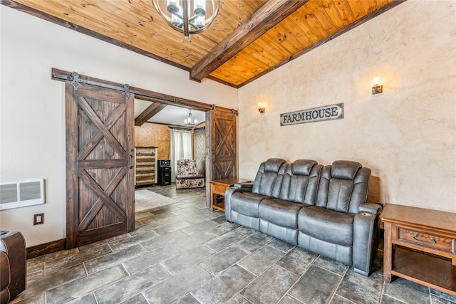 2283 US Highway 281 N, Jacksboro, TX 76458 - living room featuring a barn door, wooden ceiling with exposed beams, and stone tile flooring