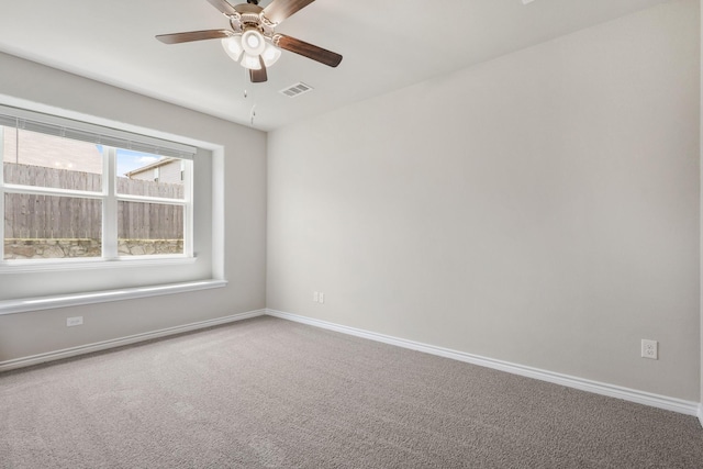 10620 Stag Ln, Fort Worth, TX 76036 - carpeted empty room featuring a ceiling fan and baseboards