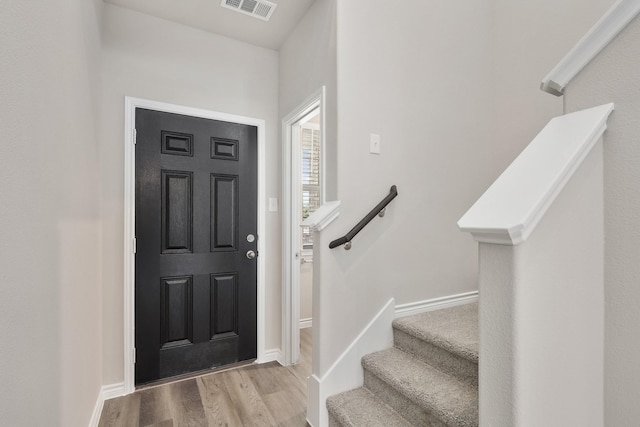 10620 Stag Ln, Fort Worth, TX 76036 - entryway featuring light wood-style flooring, baseboards, and stairway