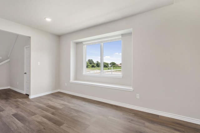 10620 Stag Ln, Fort Worth, TX 76036 - spare room with wood finished floors, baseboards, recessed lighting, and vaulted ceiling
