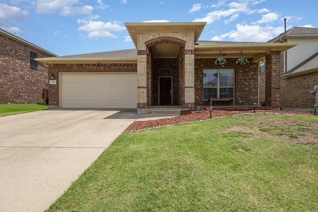 7609 Velvet Antler Trl, Arlington, TX 76002 - view of front of property with brick siding, a garage, driveway, and a front yard