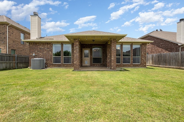 7609 Velvet Antler Trl, Arlington, TX 76002 - rear view of property with central AC, brick siding, a patio, a chimney, and roof with shingles