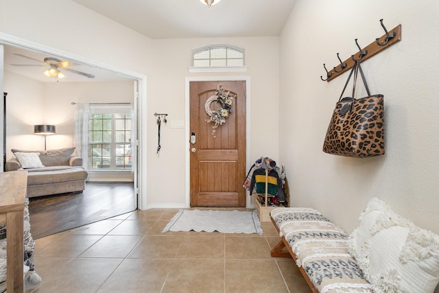 7609 Velvet Antler Trl, Arlington, TX 76002 - tiled entryway with plenty of natural light, a ceiling fan, and baseboards