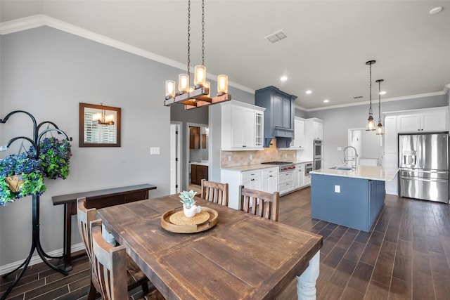 15070 Fm 916, Maypearl, TX 76064 - dining space featuring dark wood-type flooring, ornamental molding, recessed lighting, and baseboards