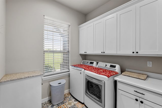 15070 Fm 916, Maypearl, TX 76064 - laundry area featuring cabinet space, washing machine and dryer, and baseboards