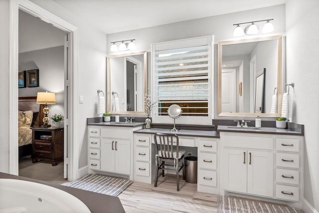 16471 Prairie Oak Rd, Frisco, TX 75033 - full bathroom with double vanity and a tub