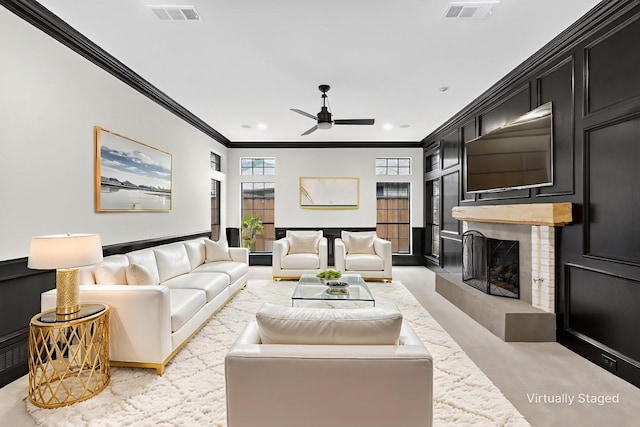 4000 Tumbril Ln, Plano, TX 75023 - living room with crown molding, a ceiling fan, a fireplace, and recessed lighting