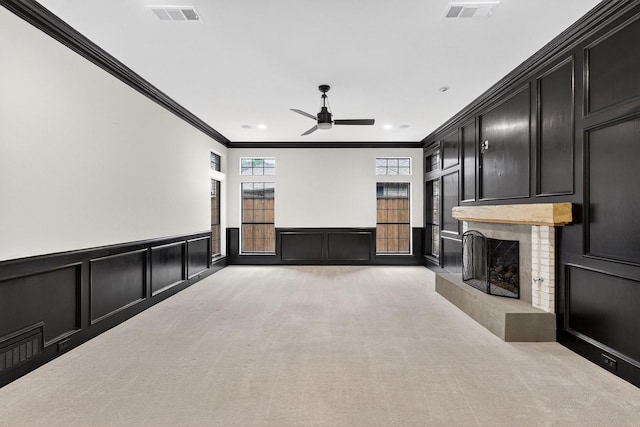 4000 Tumbril Ln, Plano, TX 75023 - cinema featuring a decorative wall, ornamental molding, light colored carpet, a ceiling fan, and a fireplace with raised hearth