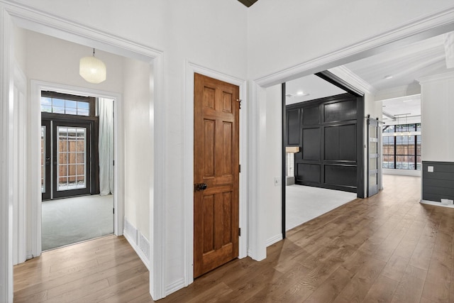4000 Tumbril Ln, Plano, TX 75023 - entrance foyer with wood finished floors, baseboards, and ornamental molding