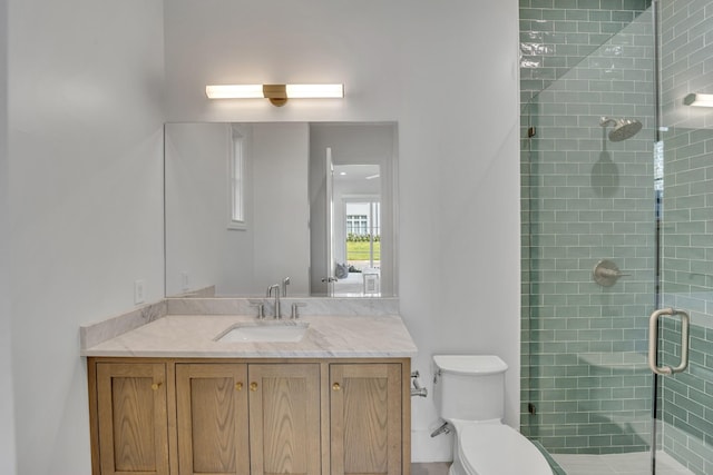 7141 Lyre Ln, Dallas, TX 75214 - full bath featuring a stall shower, toilet, and vanity