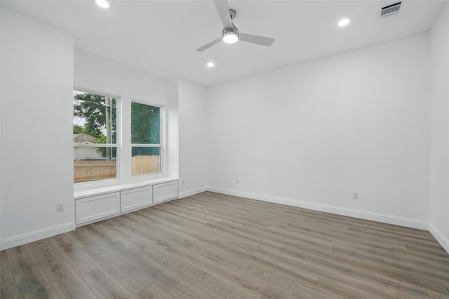 3220 N Houston, Fort Worth, TX 76106 - empty room featuring wood finished floors, recessed lighting, ceiling fan, and baseboards