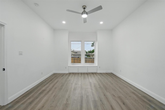 3220 N Houston, Fort Worth, TX 76106 - spare room with wood finished floors, a ceiling fan, recessed lighting, baseboards, and a smoke detector