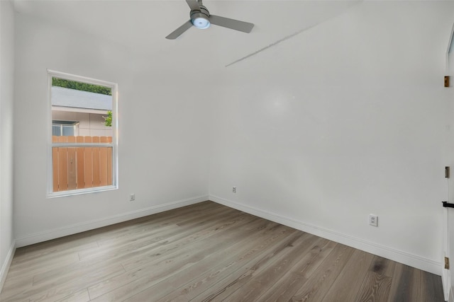 3220 N Houston, Fort Worth, TX 76106 - spare room with baseboards, ceiling fan, and wood finished floors