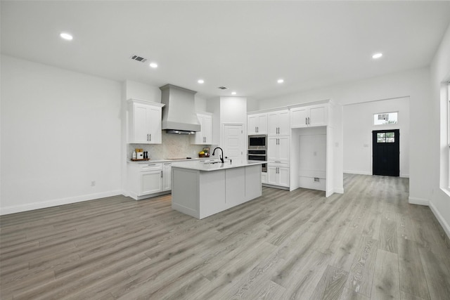 3220 N Houston, Fort Worth, TX 76106 - kitchen with appliances with stainless steel finishes, custom exhaust hood, a sink, white cabinets, and recessed lighting