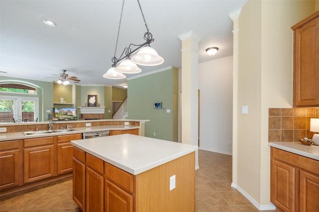 1060 Shepherd Ct, Lantana, TX 76226 - kitchen with a sink, a kitchen island, a ceiling fan, light tile patterned floors, and backsplash