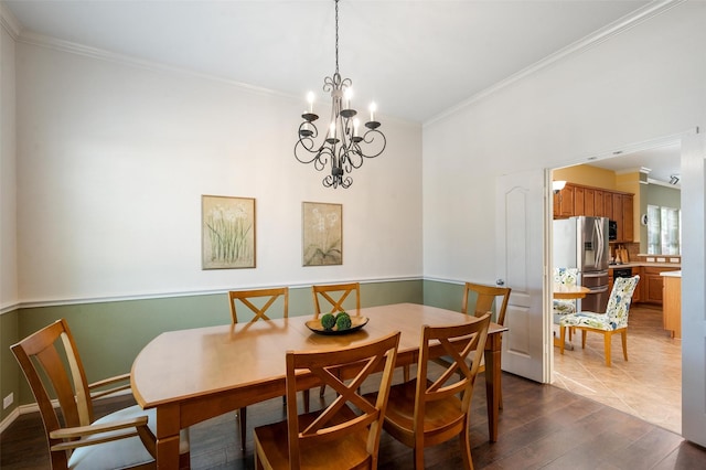 1060 Shepherd Ct, Lantana, TX 76226 - dining space with dark wood finished floors, ornamental molding, and a chandelier