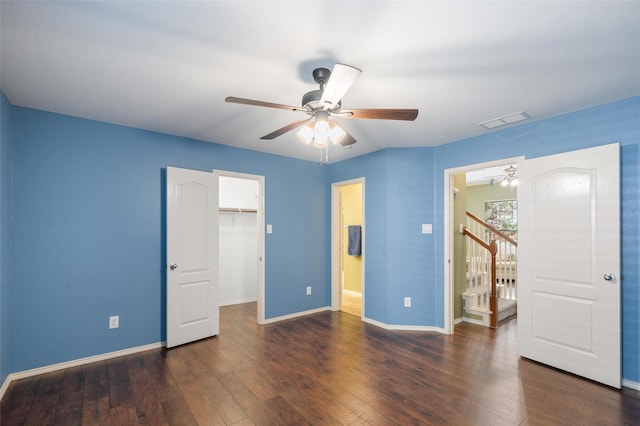 1060 Shepherd Ct, Lantana, TX 76226 - unfurnished bedroom featuring baseboards, wood-type flooring, a spacious closet, a closet, and ensuite bath