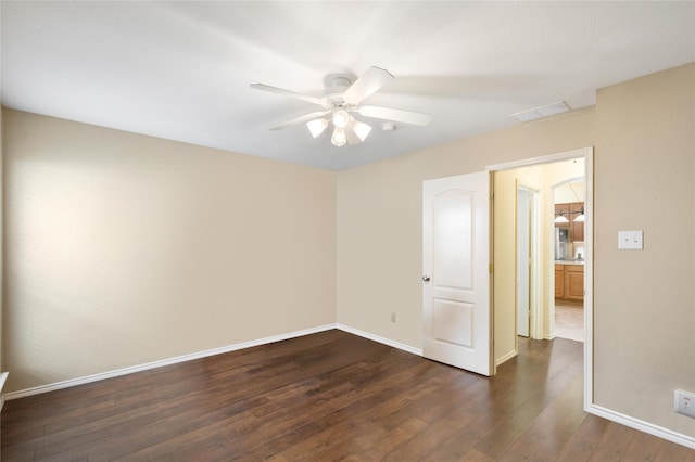 1060 Shepherd Ct, Lantana, TX 76226 - spare room featuring baseboards, dark wood-type flooring, and a ceiling fan