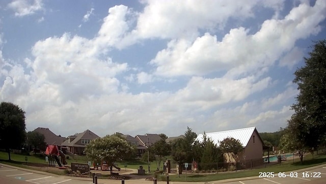 1060 Shepherd Ct, Lantana, TX 76226 - view of asphalt road with curbs and sidewalks