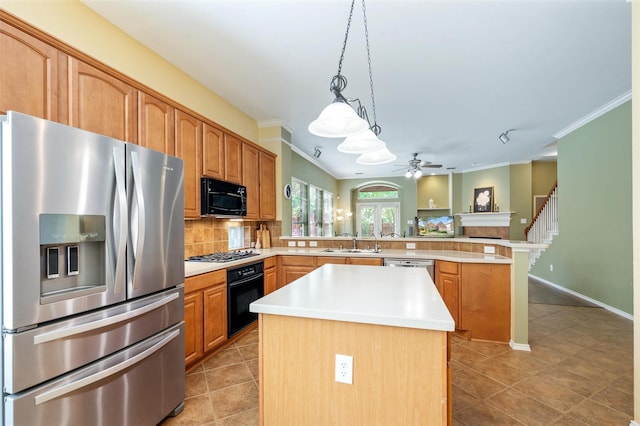 1060 Shepherd Ct, Lantana, TX 76226 - kitchen with black appliances, a peninsula, ceiling fan, a sink, and crown molding